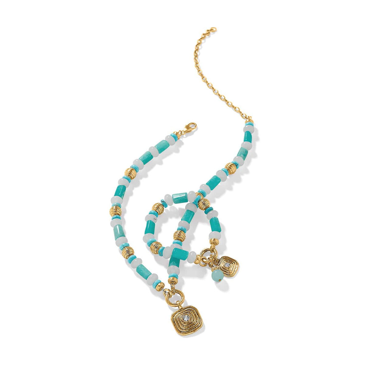Brighton beaded necklace with turquoise, white beads, gold-tone accents, and square crystal pendants on a white background