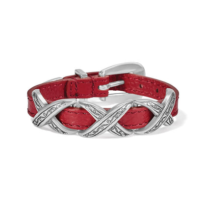 Brighton bracelet with red leather band, silver-plated engraved X-shaped stations, and buckle closure on a white background