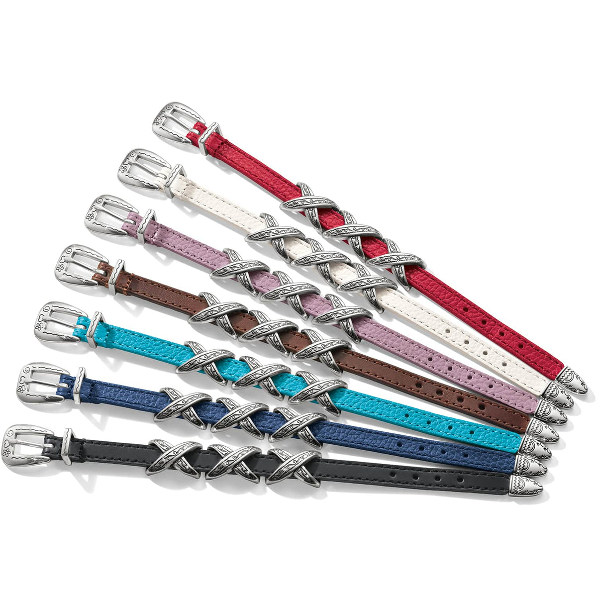 Brighton leather bracelets in seven colors with silver-plated engraved buckles and crisscross accents on a white background
