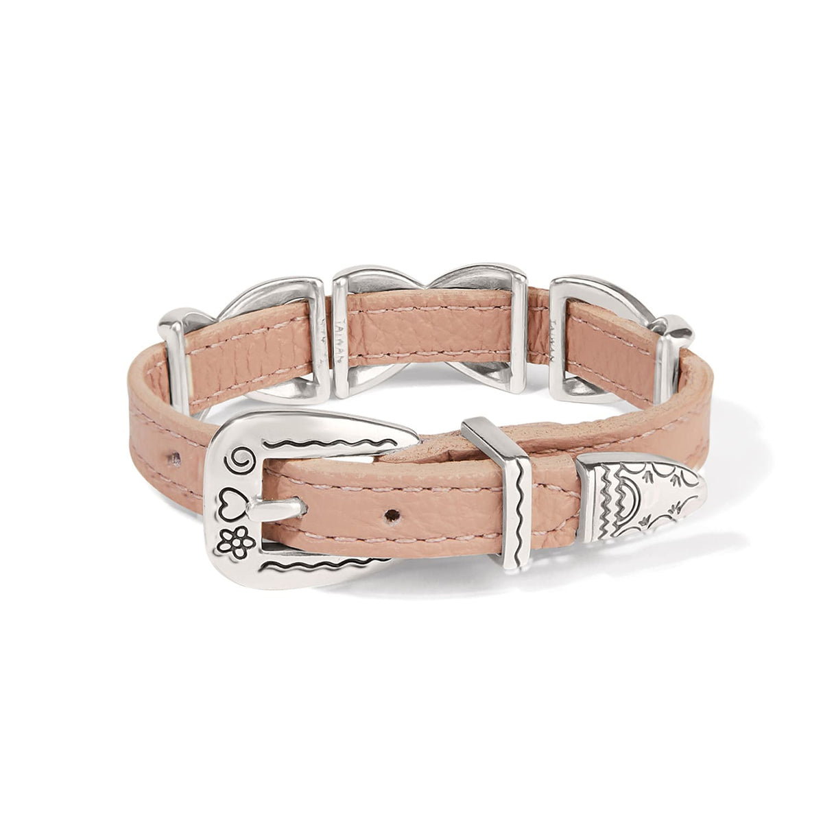 Brighton leather bracelet in pink with silver-plated engraved buckle closure and decorative loops on a white background