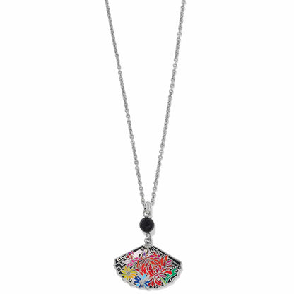 Brighton pendant necklace with silver-plated fan charm, colorful enamel floral design, and black bead on a white background