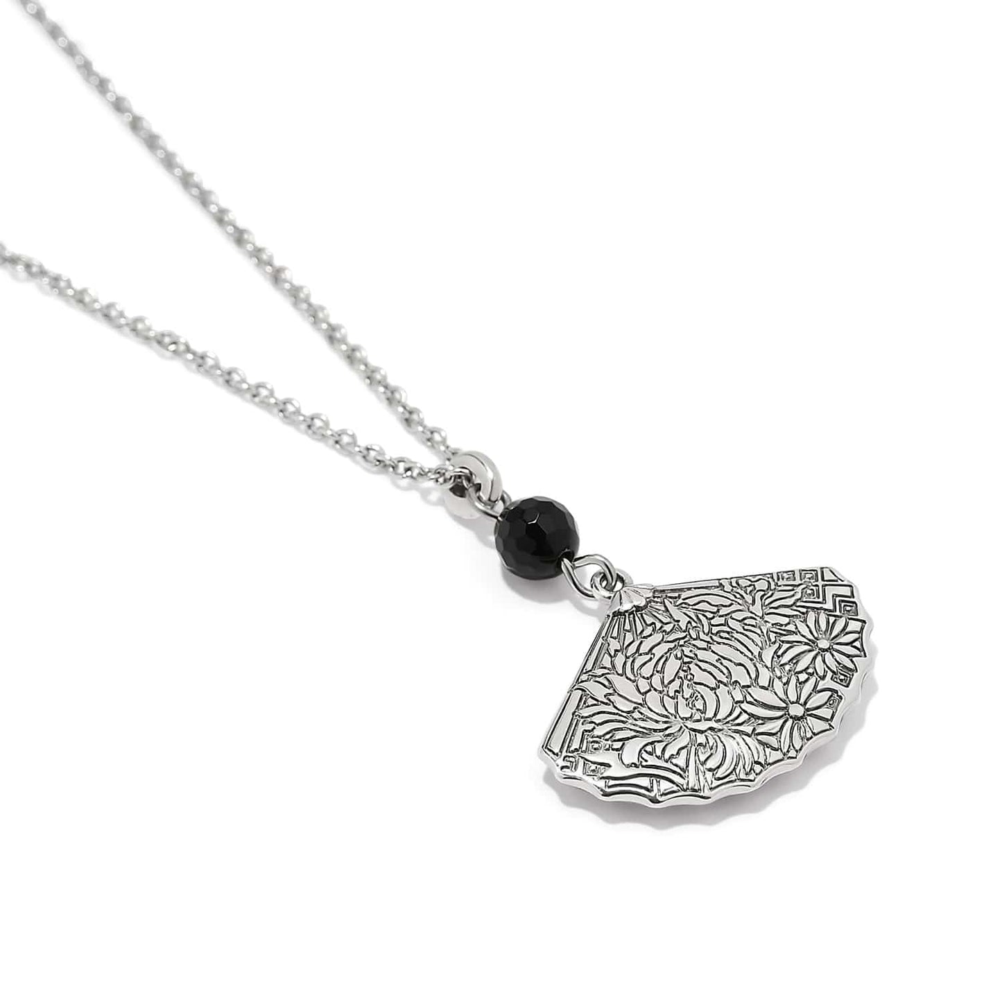 Brighton pendant necklace with silver-plated fan charm featuring floral engraving and black faceted bead on a white background