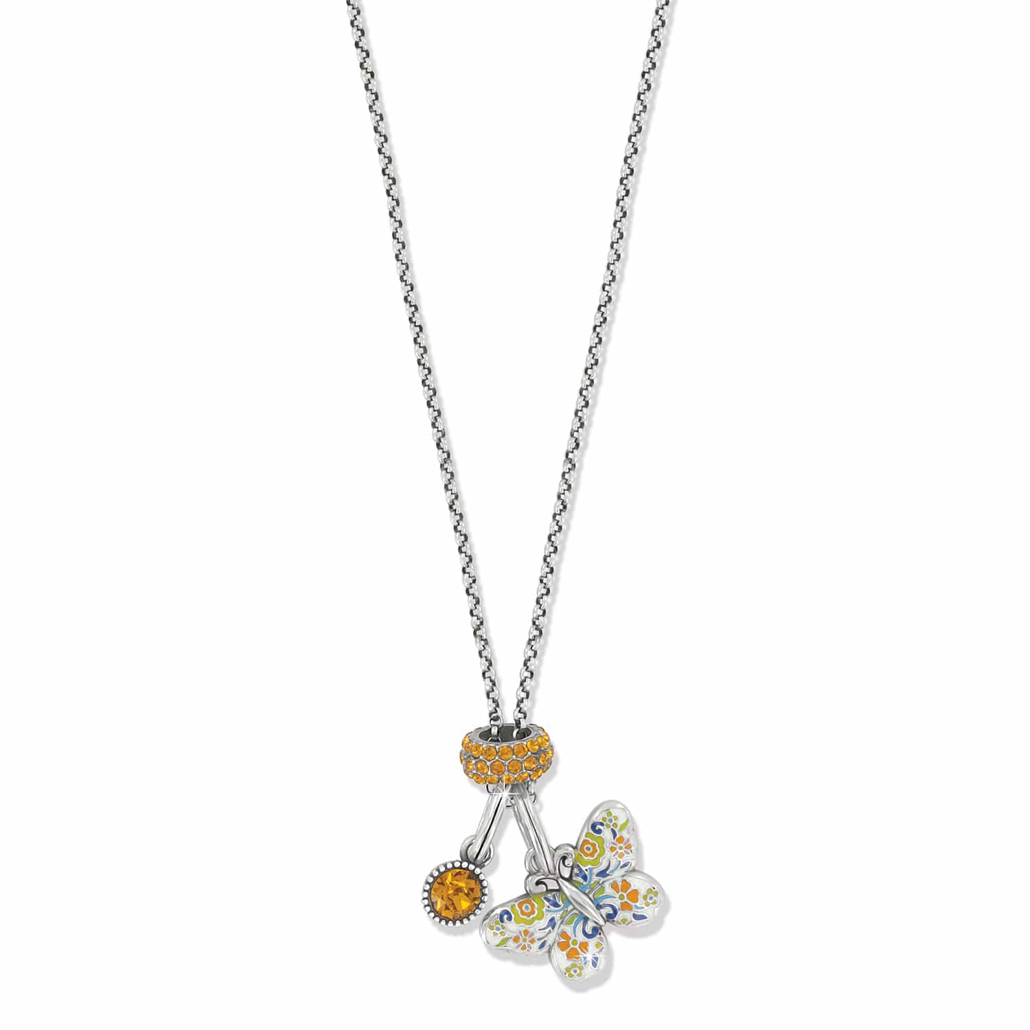 Brighton charm necklace with silver-plated chain, orange crystal charms, and enamel floral butterfly pendant on a white background