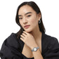 Model wearing a Brighton silver-plated watch with beaded bracelet band, crystal-accented bezel, and white dial