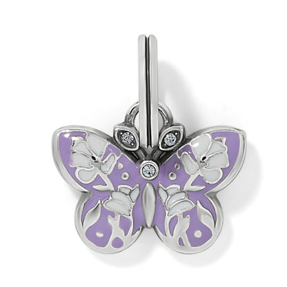 Brighton butterfly charm with purple and white enamel floral wings and crystal accents, silver-plated, on a white background