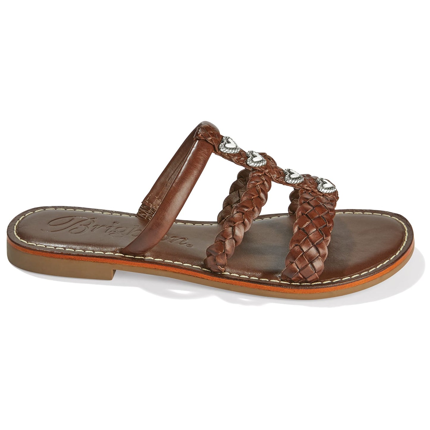 Brighton brown leather slide sandals with braided straps and silver-tone heart accents on a white background
