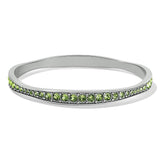 Brighton bangle bracelet with green crystal row and silver-plated finish on a white background