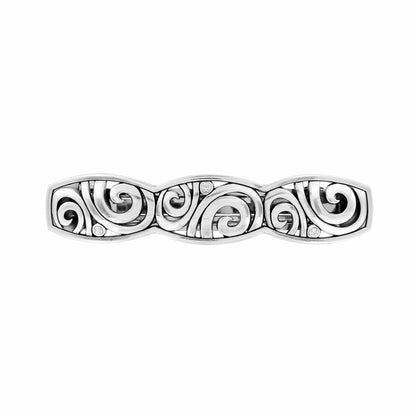 Brighton hair barrette with silver-plated openwork scroll design and small crystal accents on a white background