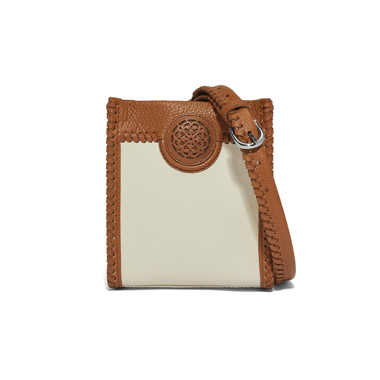 Brighton crossbody handbag in cream and tan leather with whipstitch trim, medallion accent, and silver-tone buckle on a white background