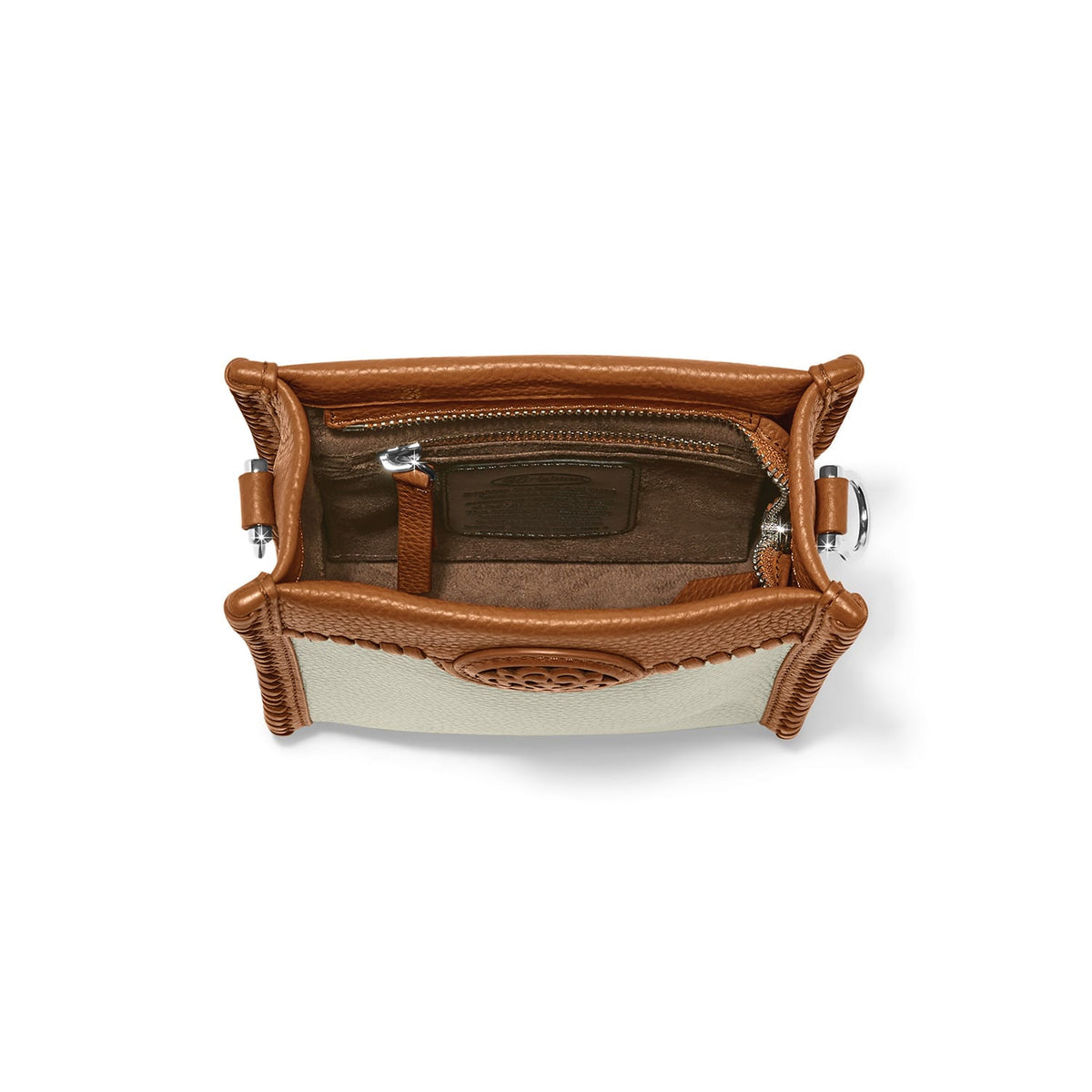Brighton tan leather handbag interior view showing zippered pocket, suede lining, and silver-tone hardware on a white background