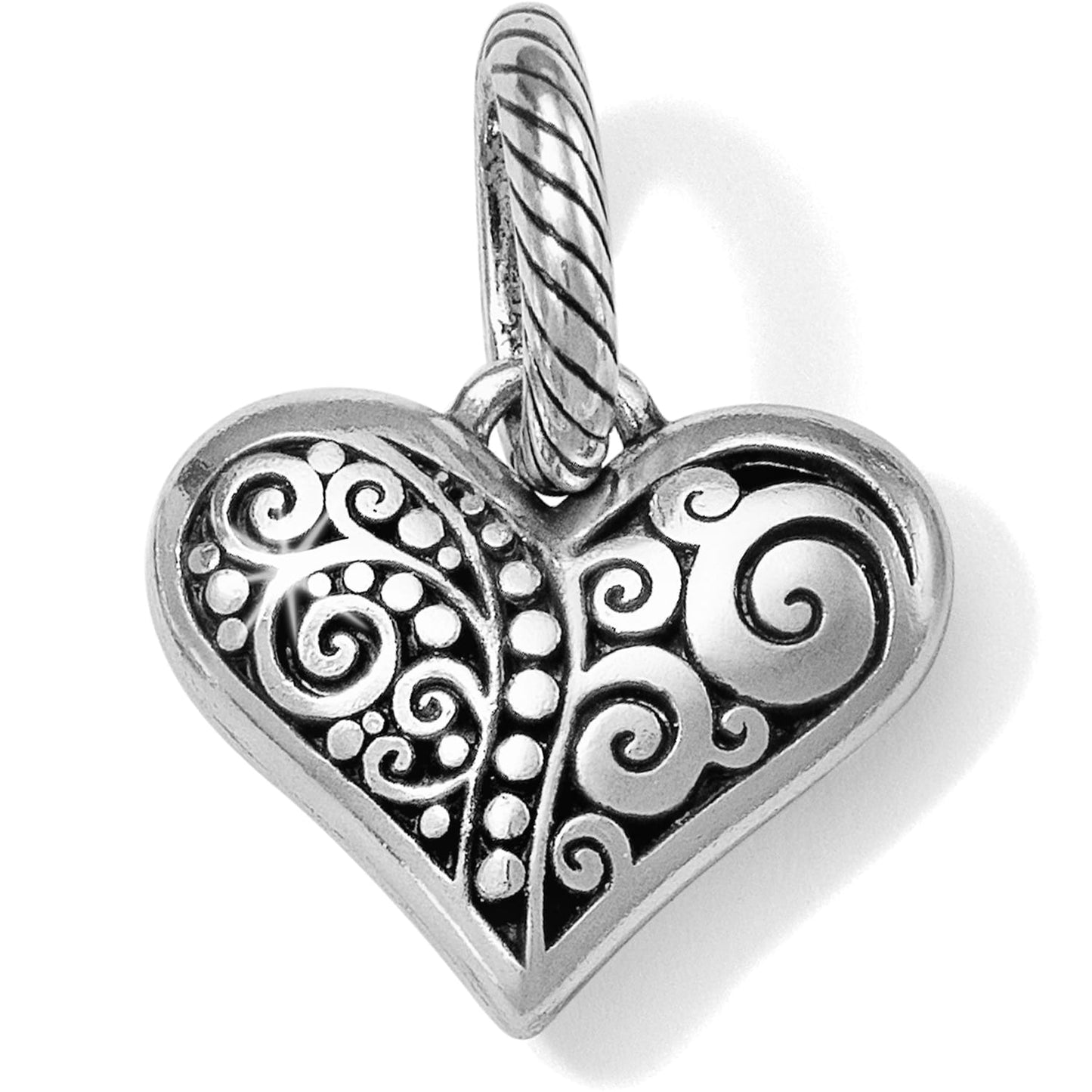 Brighton heart charm with silver-plated scroll and dot filigree design and twisted rope loop on a white background