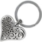 Brighton keychain with silver-plated filigree heart charm and split ring featuring scroll and dot detailing on a white background