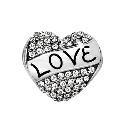 Brighton heart charm with pave crystals and silver-plated Love banner across the center on a white background