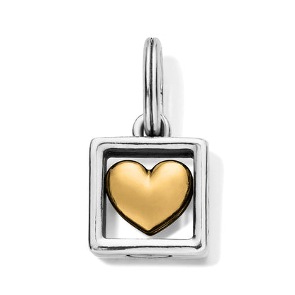 Brighton charm with gold-tone heart inside silver-tone square frame and split ring on a white background