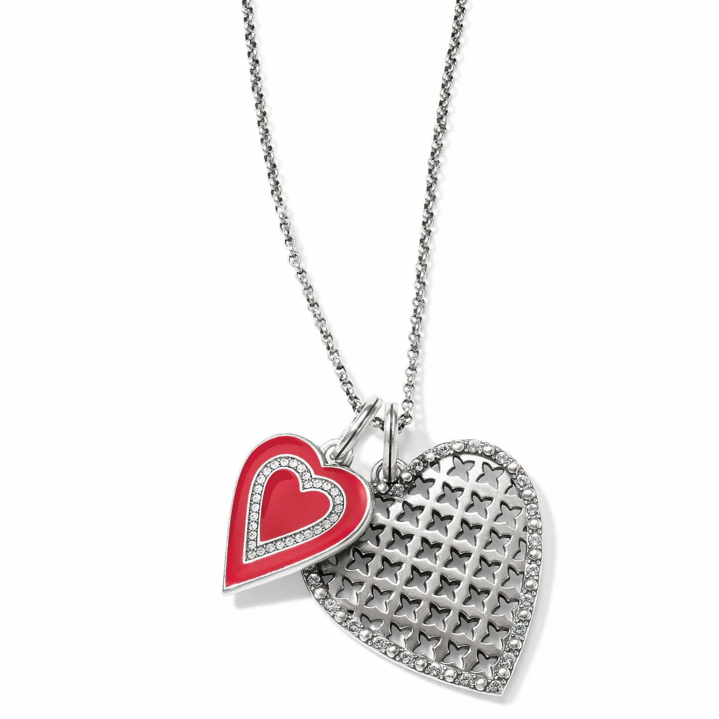 Brighton pendant necklace with red enamel heart and silver-plated openwork heart with crystal accents on a white background
