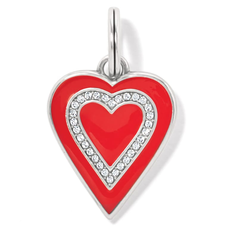 Brighton heart charm with red enamel, crystal-lined inner heart, and silver-plated finish on a white background