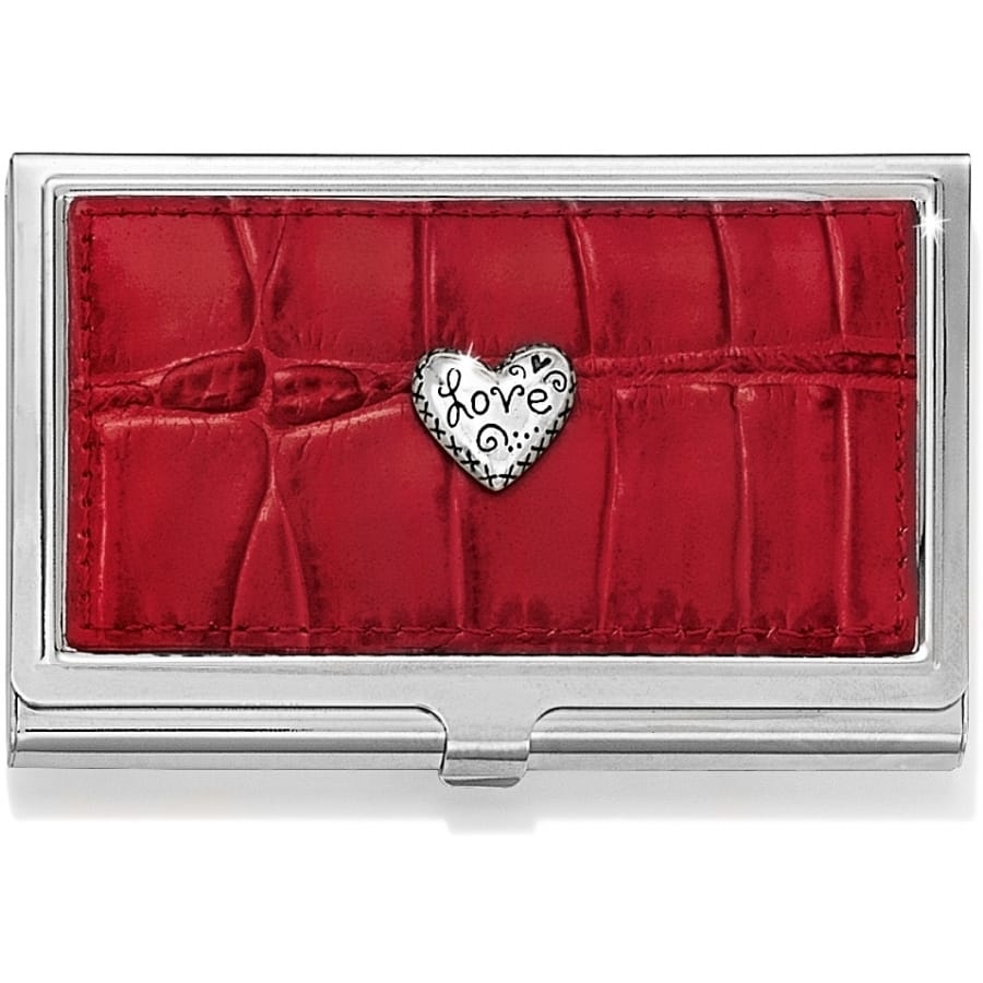Brighton business card case with red croc-embossed leather panel and silver-tone heart love medallion on a white background
