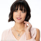 Model wearing a Brighton silver-plated necklace with heart and key pendant charms on a delicate chain