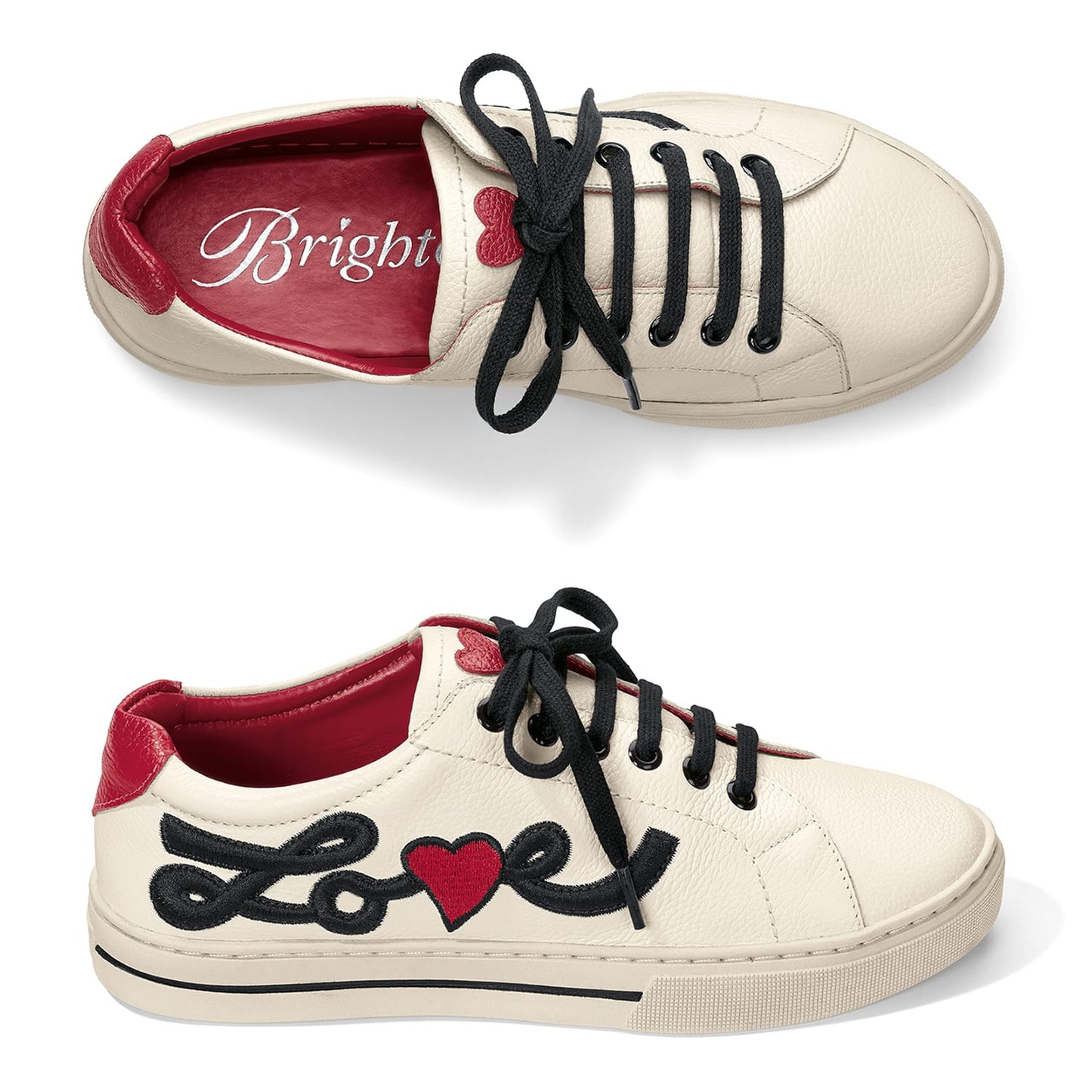 Brighton white leather sneakers with black laces, red heel accents, and embroidered Love script with heart on a white background