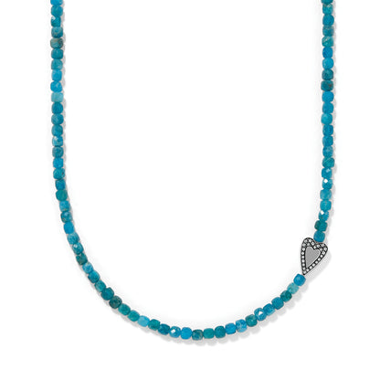 Brighton beaded necklace with natural dark blue apatite stones and silver-plated heart accent on a white background