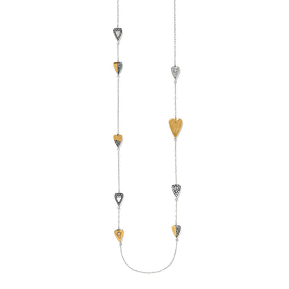 Brighton long station necklace with two-tone heart charms and crystal accents on a white background