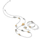 Brighton two-tone heart jewelry set styled with matching bangle bracelet and ring featuring crystal accents on white background