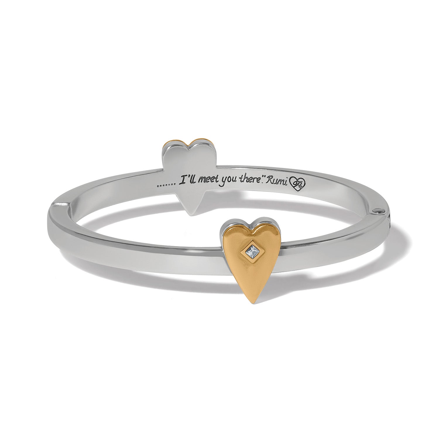 Brighton hinged bangle bracelet with two-tone heart accents, crystal center, and engraved Rumi quote on a white background