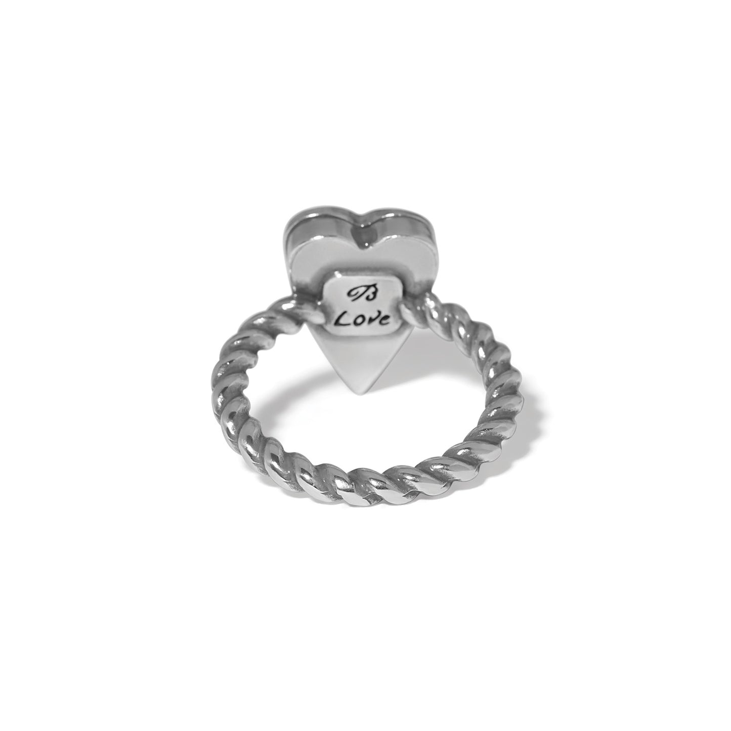 Brighton heart ring shown from the back with twisted rope band and engraved Love detail on a white background