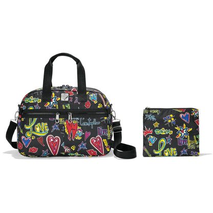 Brighton handbag with graffiti-style heart and love print, matching zip pouch, and black handles on a white background