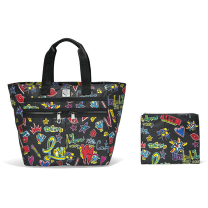 Brighton tote handbag with graffiti-style love and dream print, black handles, and matching zip pouch on a white background
