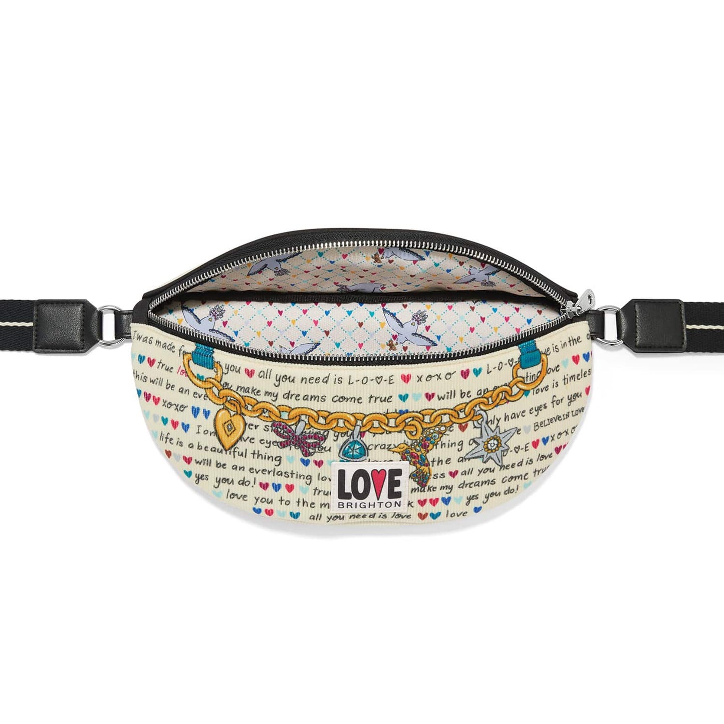 Brighton belt bag shown open with love-themed script print, charm bracelet graphic, and adjustable strap on a white background