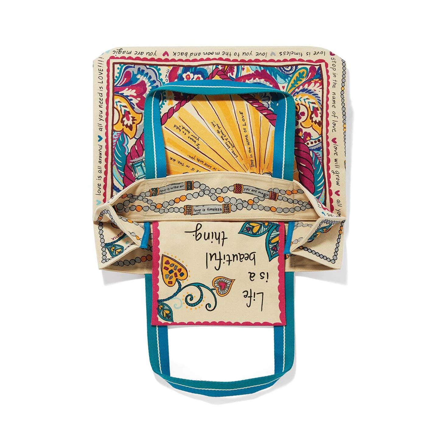 Brighton canvas tote bag shown open with paisley print, Life is a beautiful thing text, and teal handles on a white background