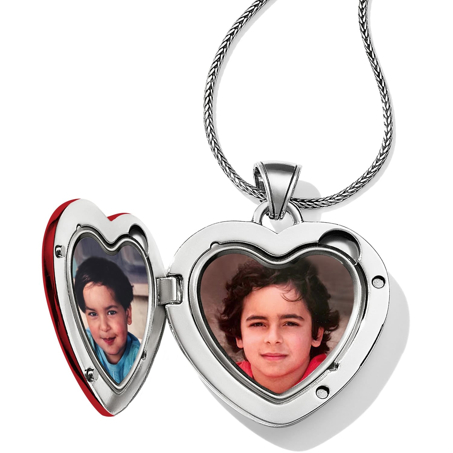 Brighton silver-plated heart locket necklace shown open with two photos inside and woven chain on a white background