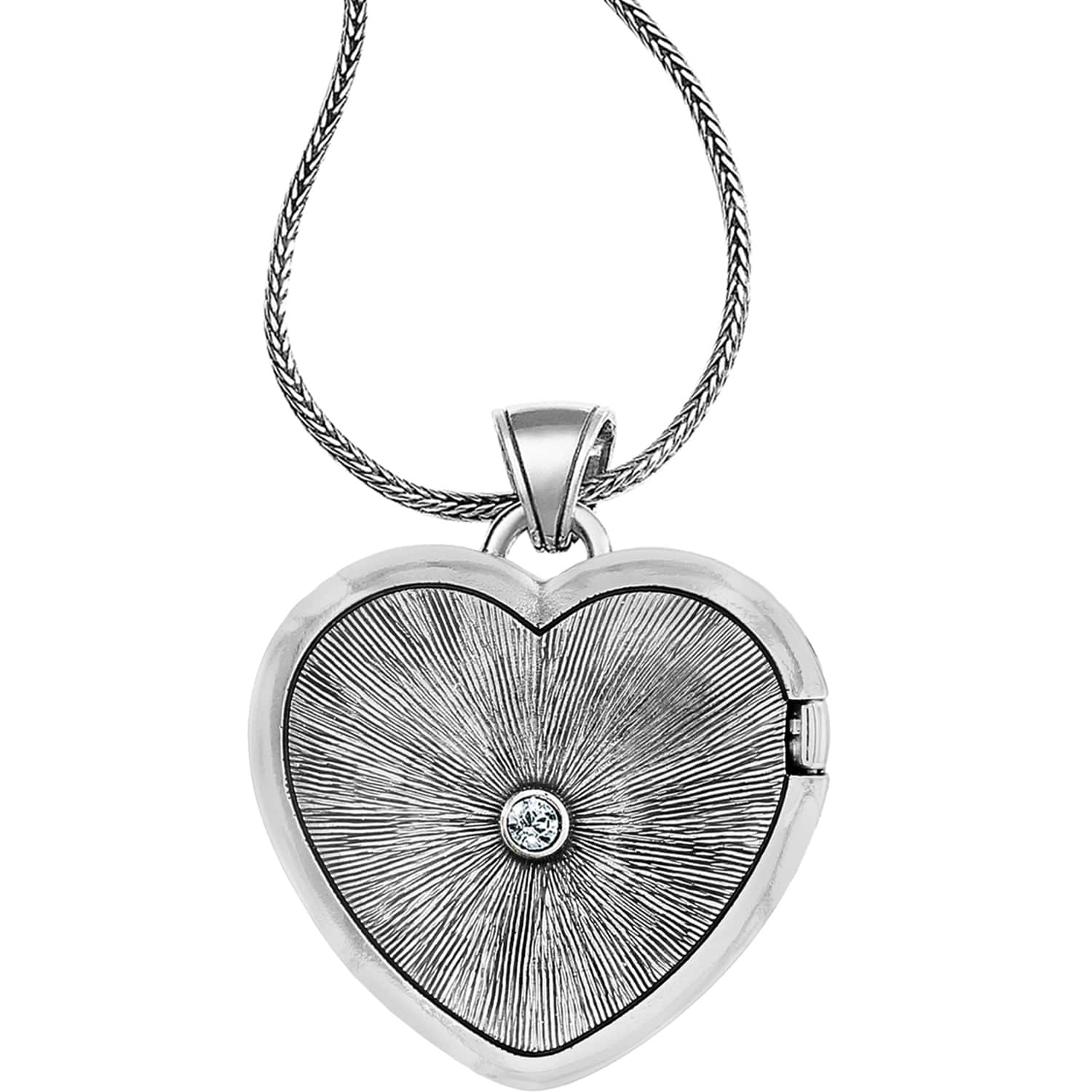 Brighton heart locket necklace with silver-plated sunburst design, center crystal, and foxtail chain on a white background
