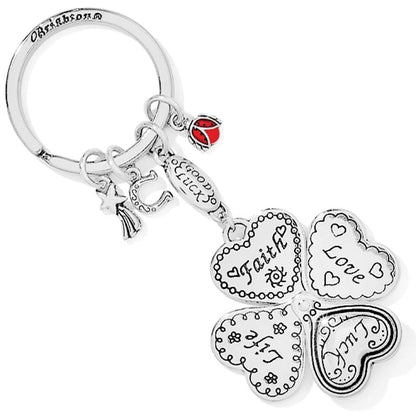 Brighton silver-plated keychain with four-leaf clover heart charms reading Faith, Love, Life, Luck and ladybug on a white background