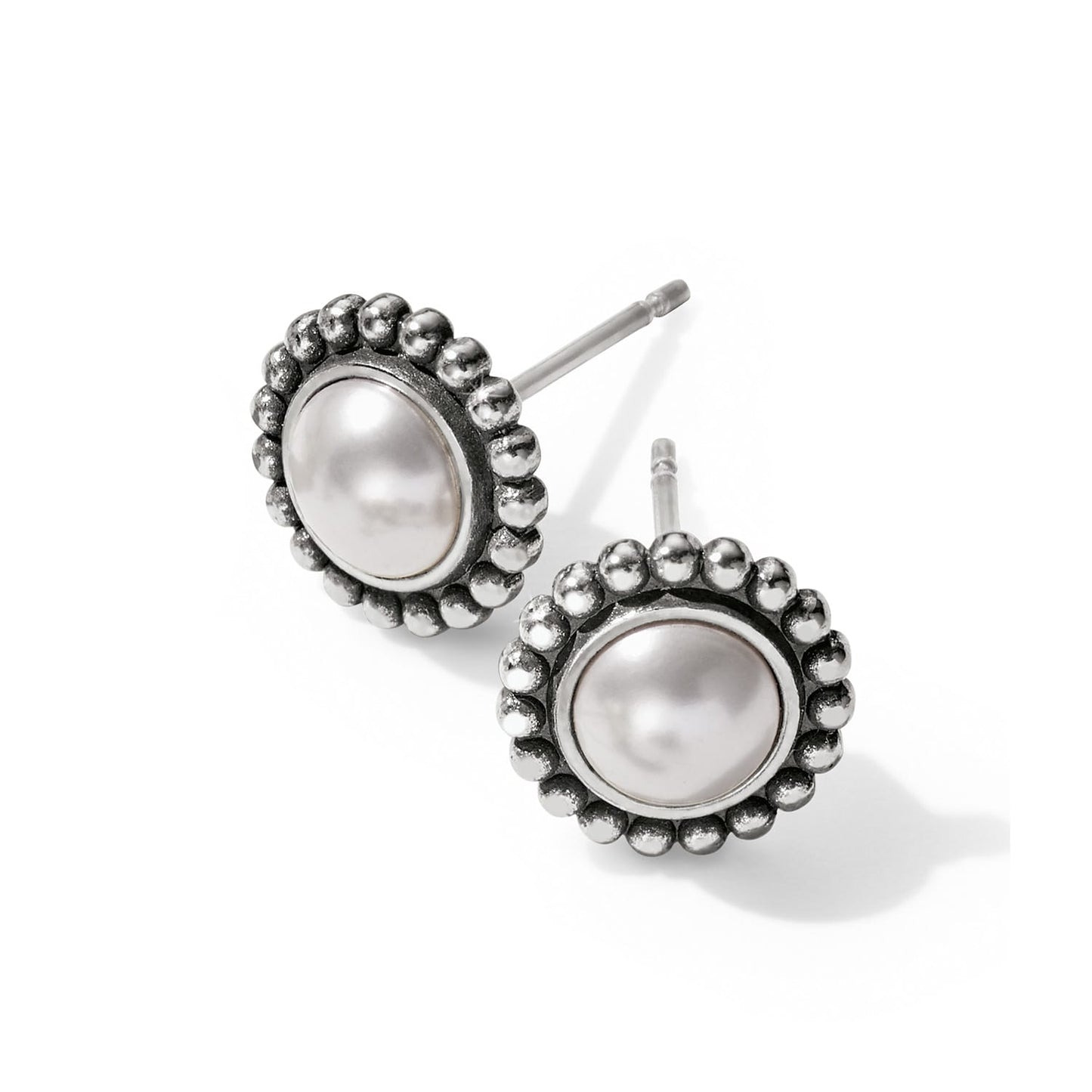 Brighton stud earrings with pearl centers and silver-plated beaded borders on a white background