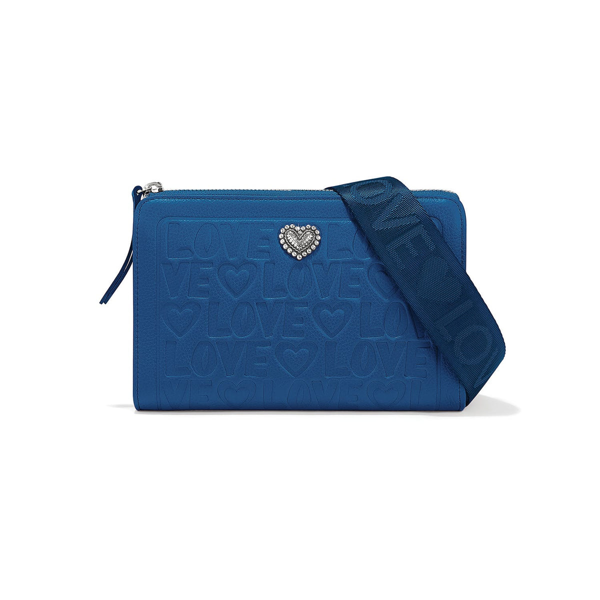Brighton blue leather crossbody handbag with embossed Love print, silver heart accent, and woven strap on a white background