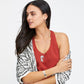 Model wearing a Brighton silver-plated pendant necklace with figural charm and coordinating hoop earrings and bracelet