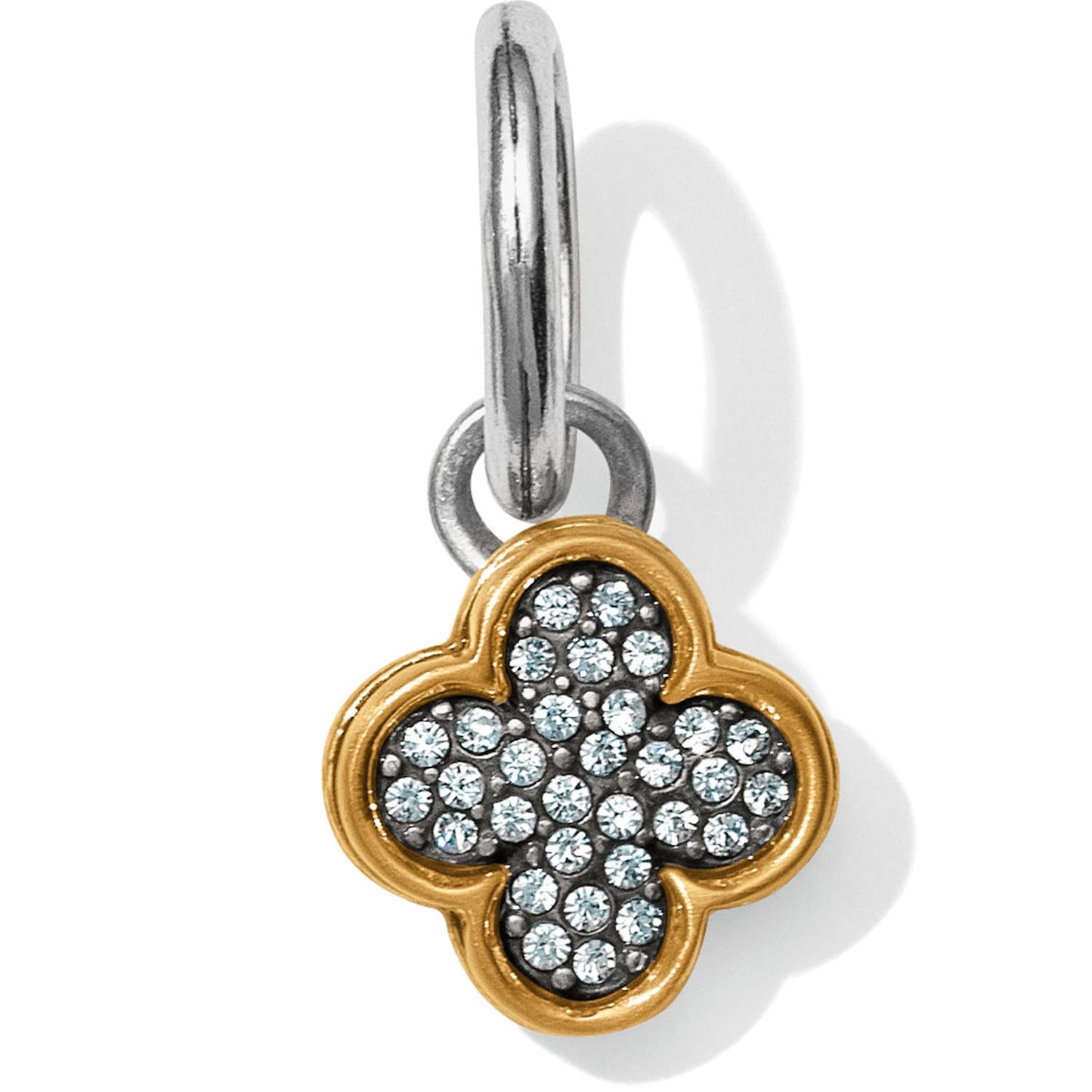 Brighton clover charm with gold-tone border and pavé crystal center on a silver-tone ring on a white background