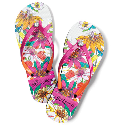 Brighton flip flop sandals with pink and orange straps, crystal accents, and tropical floral print on a white background