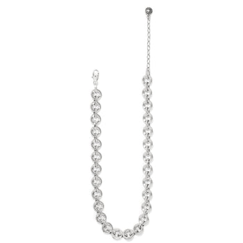 Brighton silver-plated chain necklace with round links, lobster clasp, and decorative openwork bead on a white background