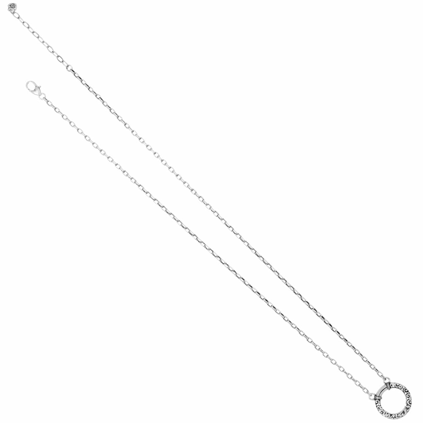 Brighton silver-plated necklace with elongated cable chain, lobster clasp, and scroll-detailed circular pendant on a white background