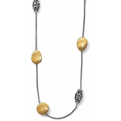 Brighton necklace with hammered brushed gold discs and silver-plated scroll beads on snake chain on a white background
