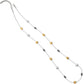 Brighton long station necklace with silver-plated chain, hammered brushed gold discs, and scrollwork beads on a white background