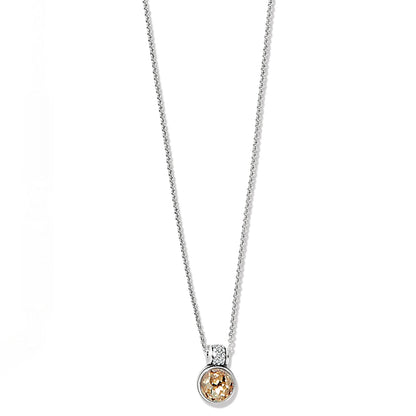 Brighton pendant necklace with round champagne crystal and silver-plated crystal-accented bail on a white background