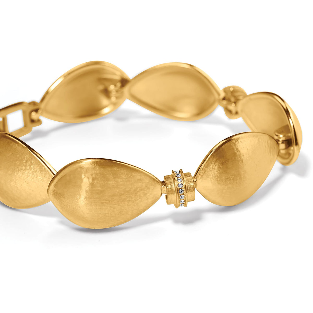 Brighton bracelet with brushed gold-plated teardrop links and crystal-accented magnetic clasp on a white background