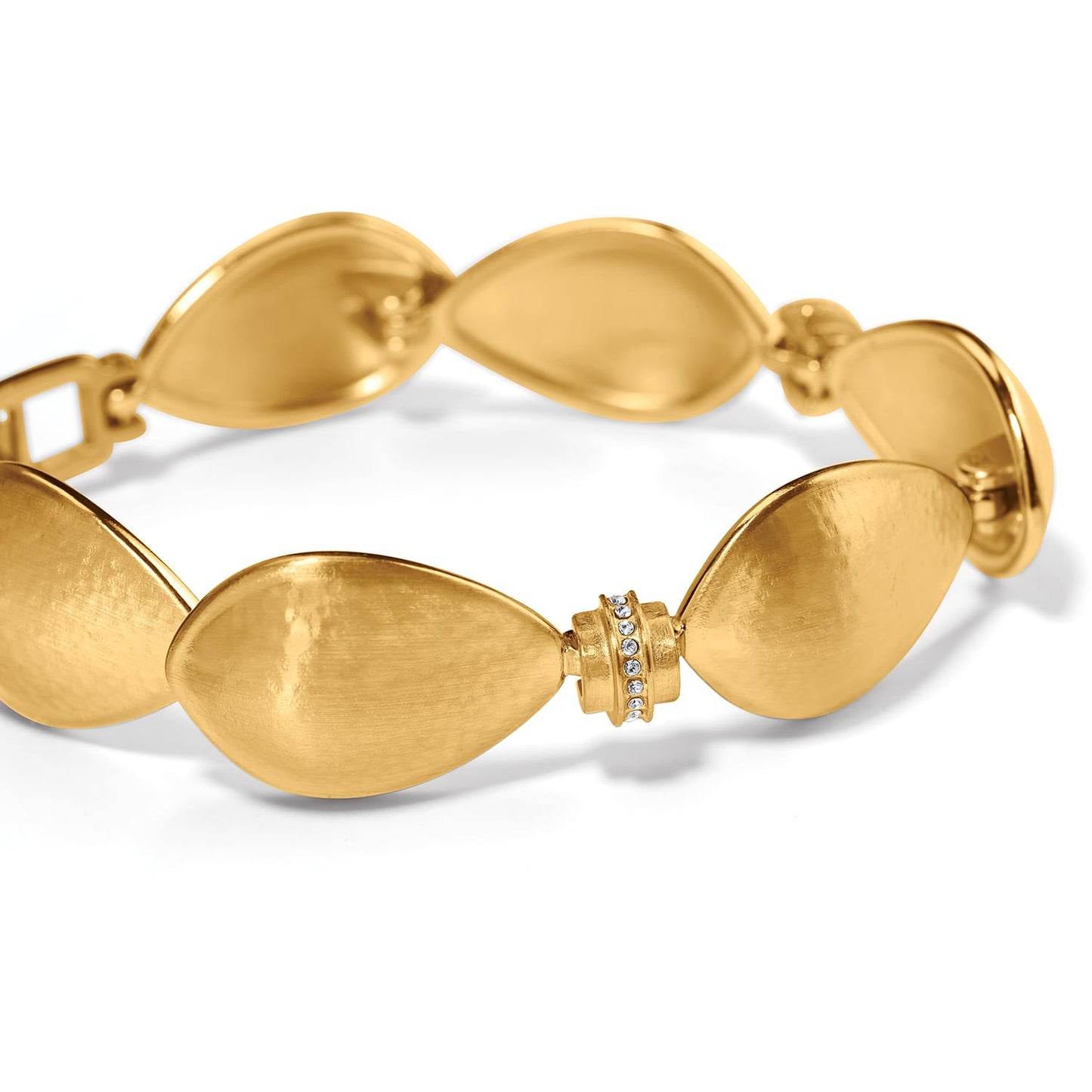 Brighton bracelet with brushed gold-plated teardrop links and crystal-accented magnetic clasp on a white background