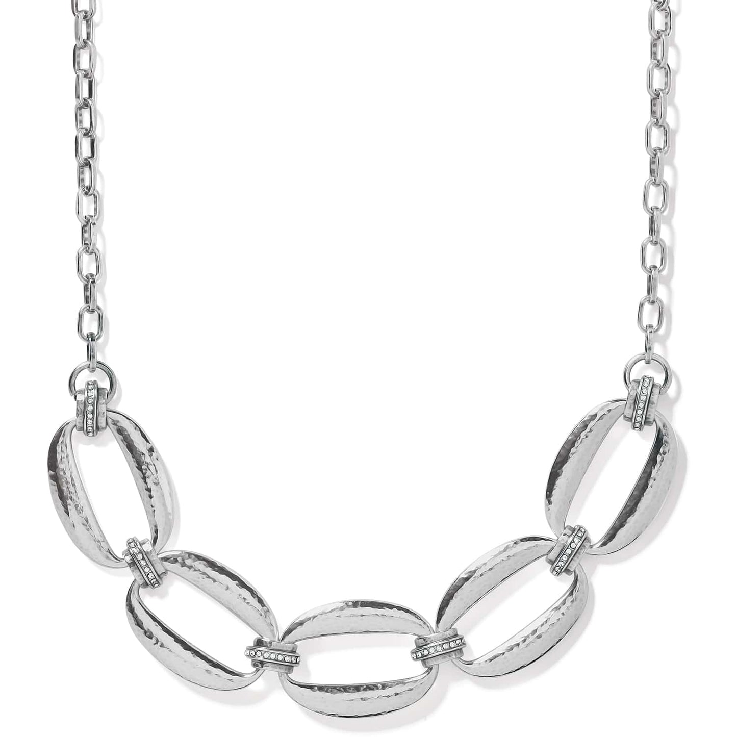 Brighton necklace with hammered silver-plated oval links and crystal-accented connectors on a chain on a white background