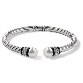 Brighton silver-plated hinged cuff bracelet with pearl end caps, crystal pavé, and black lacquer accents on a white background