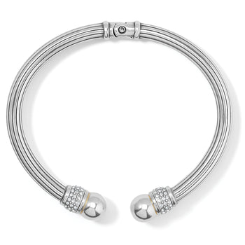 Brighton hinged cuff bracelet with silver-plated grooved band and crystal-encrusted ball end caps on a white background